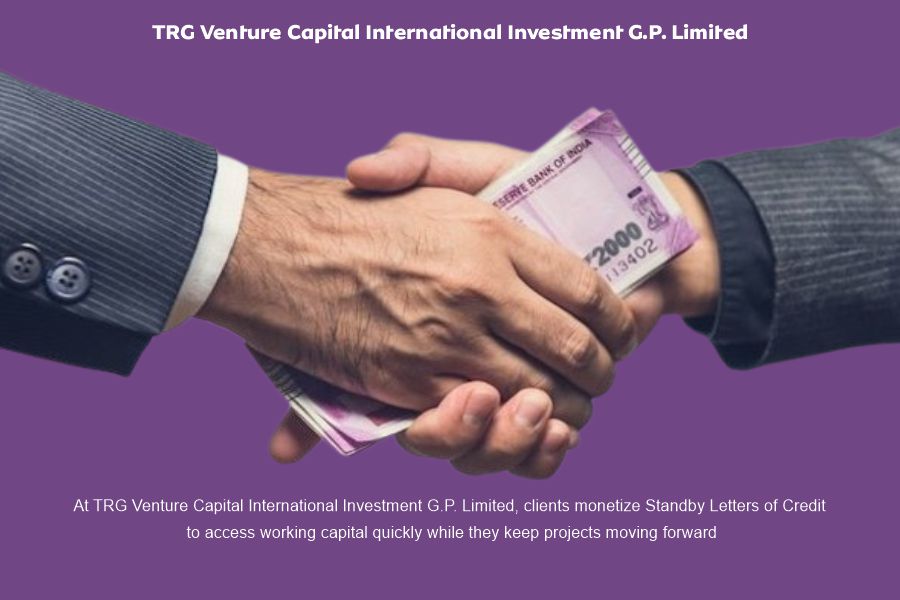 Two professionals shaking hands while exchanging currency, representing SBLC monetization at TRG Venture Capital to unlock fast working capital for business projects